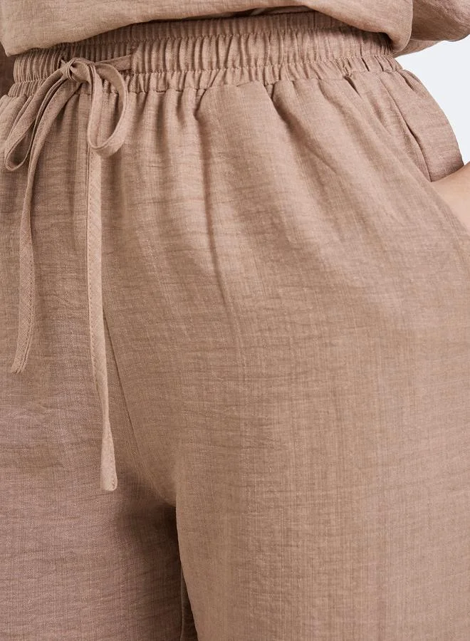 ستايلي بنطال بأرجل واسعة بنمط نسيج كتان